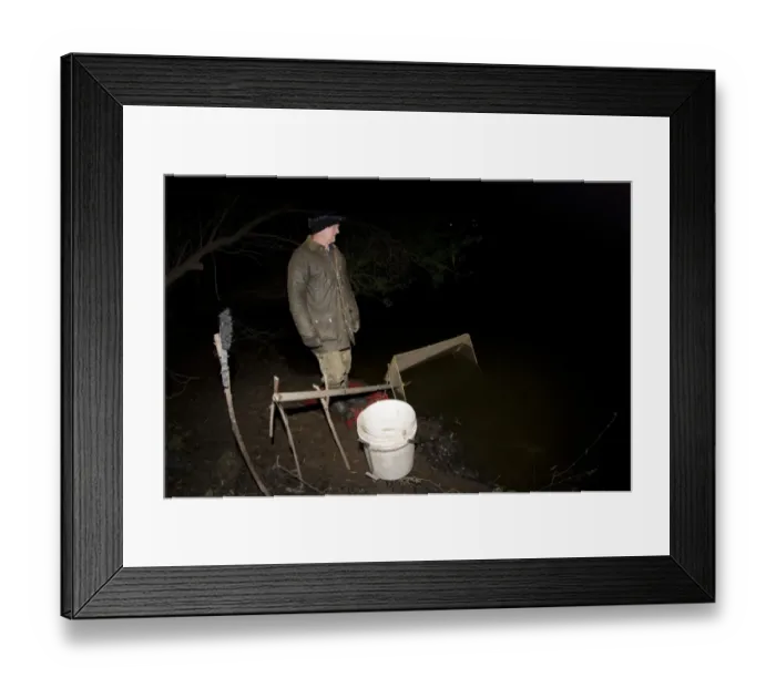 Framed Print : European Eel (Anguilla anguilla) elver fisherman at night, River Severn, Gloucestershire, England, April Framed Print : European Eel (Anguilla anguilla) elver fisherman at night, River Severn, Gloucestershire, England, April