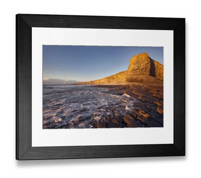 Framed Print : View of limestone cliffs in evening sunlight, Nash Point, Glamorgan Heritage Coast, Vale of Glamorgan, Wales, November Framed Print : View of limestone cliffs in evening sunlight, Nash Point, Glamorgan Heritage Coast, Vale of Glamorgan, Wales, November