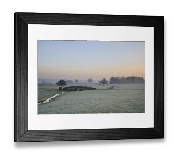 Framed Print : View of arched bridge over beck flowing through parkland at dawn, Hovingham Park, Hovingham, North Yorkshire, England Framed Print : View of arched bridge over beck flowing through parkland at dawn, Hovingham Park, Hovingham, North Yorkshire, England