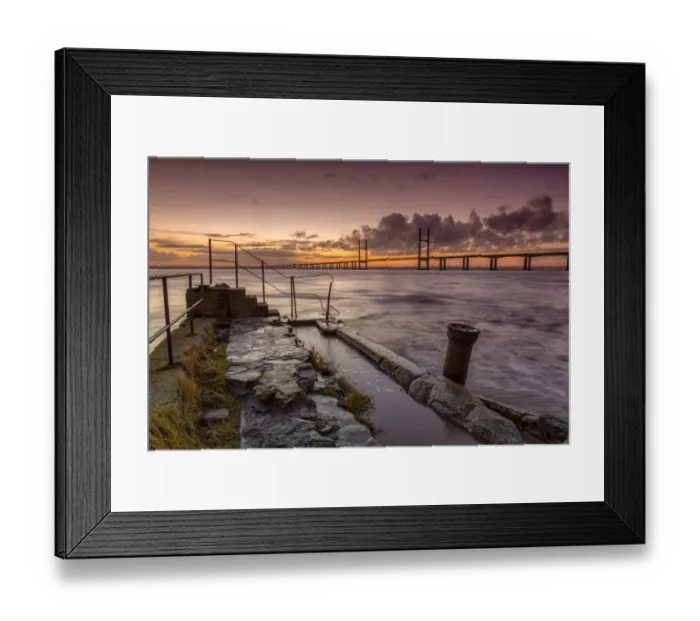 Framed Print : View of jetty and road bridge at sunrise, Sudbrook Jetty, Second Severn Crossing, River Severn, Severn Estuary