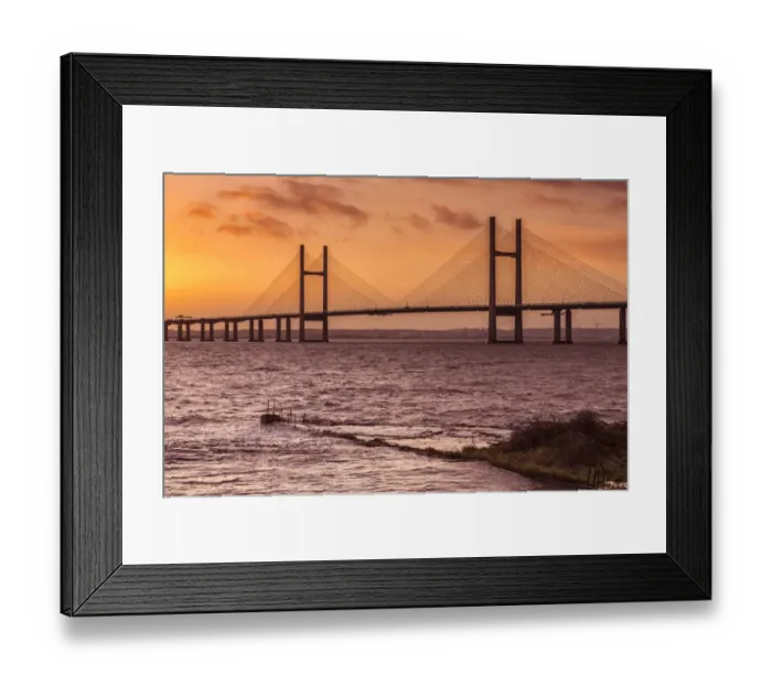 Framed Print : View of jetty, harbour wall and road bridge during very high tide and stormy conditions at sunrise, Sudbrook Jetty Framed Print : View of jetty, harbour wall and road bridge during very high tide and stormy conditions at sunrise, Sudbrook Jetty