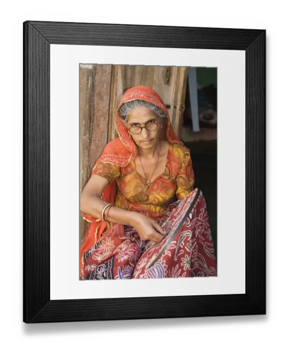 Framed Print : Indian woman with embroidery, Rajasthan, India, December