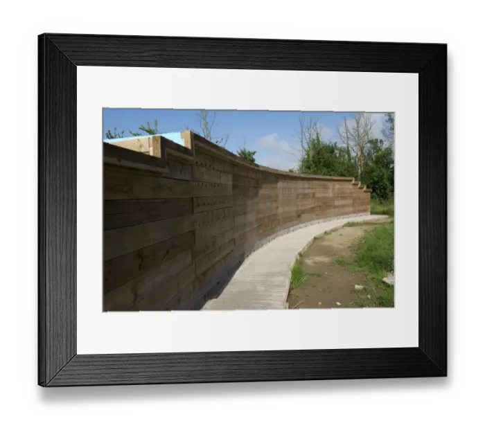 Framed Print : Wooden artificial sand martin bank and bat roost, East Devon Axe Estuary Wetlands Nature Reserve, near Seaton, Devon Framed Print : Wooden artificial sand martin bank and bat roost, East Devon Axe Estuary Wetlands Nature Reserve, near Seaton, Devon