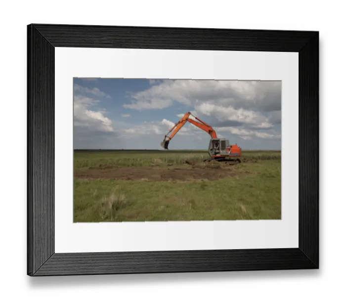 Framed Print : Using a digger for maintenance work on Deepdale Marsh north Norfolk Framed Print : Using a digger for maintenance work on Deepdale Marsh north Norfolk