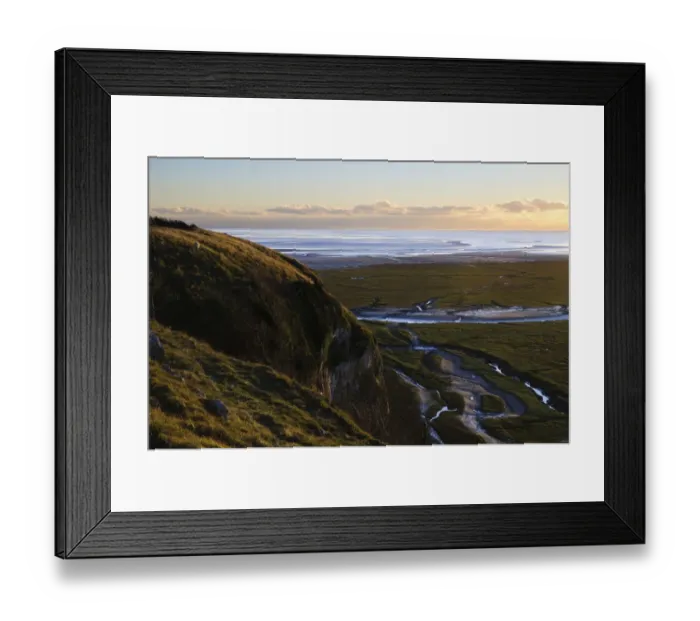 Framed Print : View of saltmarsh habitat and bay at low tide in evening light, Humphrey Head, Morecambe Bay, Cumbria, England