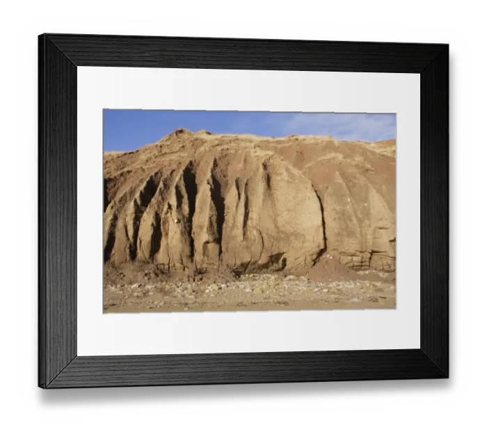 Framed Print : Eroded sea cliffs and pebbles on beach, Filey Bay, Filey, East Yorkshire, England, January Framed Print : Eroded sea cliffs and pebbles on beach, Filey Bay, Filey, East Yorkshire, England, January