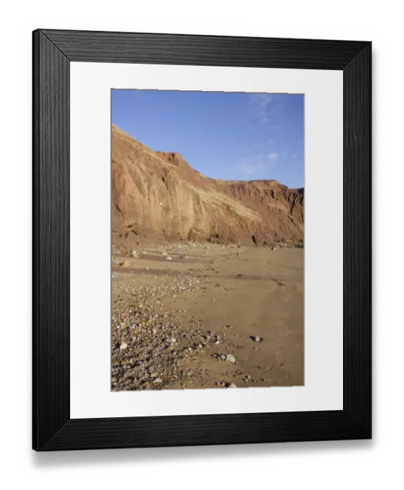 Framed Print : View of sea cliffs and pebbles on beach, Filey Bay, Filey, East Yorkshire, England, January Framed Print : View of sea cliffs and pebbles on beach, Filey Bay, Filey, East Yorkshire, England, January