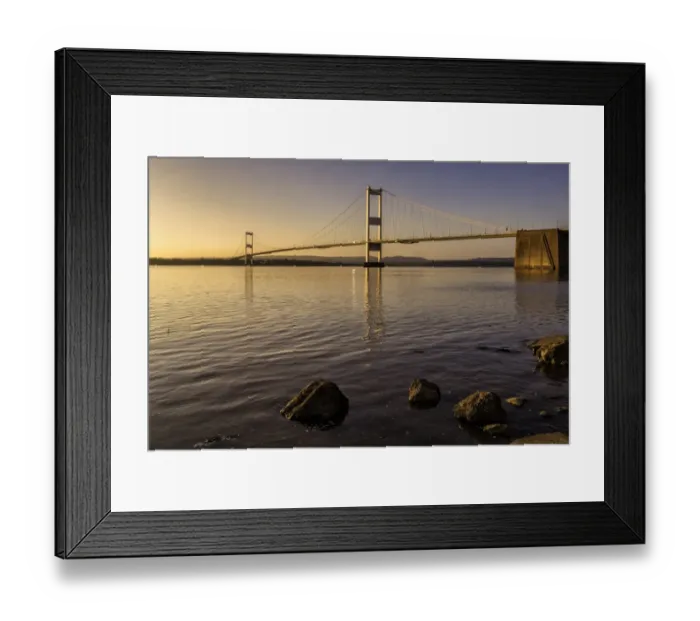 Framed Print : View of road bridge over river at sunset, viewed from Aust, Severn Bridge (First Severn Crossing), River Severn Framed Print : View of road bridge over river at sunset, viewed from Aust, Severn Bridge (First Severn Crossing), River Severn