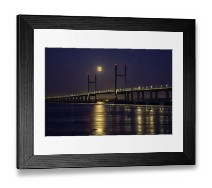 Framed Print : View of road bridge over river at twilight with full moon, viewed from Divers Rock at Sudbrook, Second Severn Crossing Framed Print : View of road bridge over river at twilight with full moon, viewed from Divers Rock at Sudbrook, Second Severn Crossing