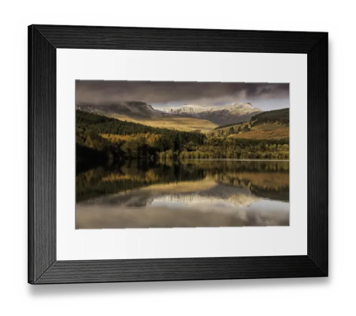 Framed Print : Trees and snow covered hills reflected in reservoir at sunrise, Penyfan and Corn Du, Taf Fechan Reservoir Framed Print : Trees and snow covered hills reflected in reservoir at sunrise, Penyfan and Corn Du, Taf Fechan Reservoir