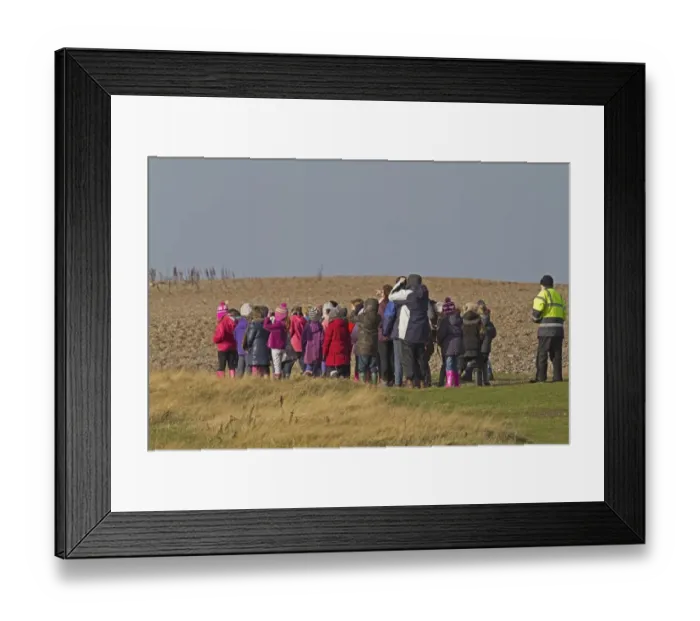 Framed Print : School group birdwatching on coast, Norfolk, England, November Framed Print : School group birdwatching on coast, Norfolk, England, November