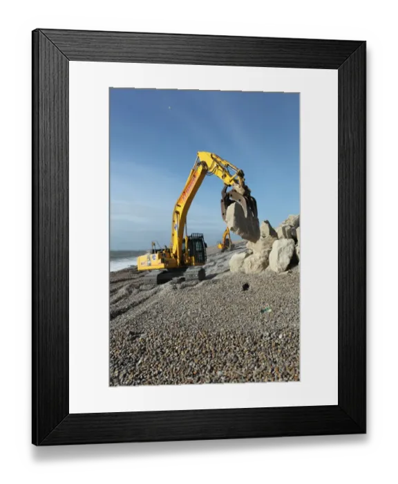Framed Print : Repairing sea defences, excavator with grabber placing boulders on shingle beach, Chesil Beach, Dorset, England Framed Print : Repairing sea defences, excavator with grabber placing boulders on shingle beach, Chesil Beach, Dorset, England
