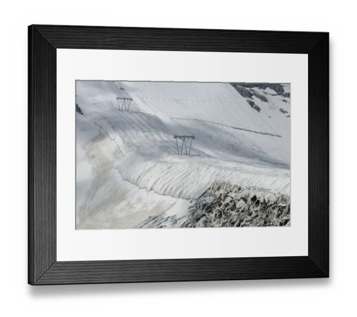 Framed Print : Protective textile covering to delay snow melting on skiing slope with ski lift, Presena Glacier, Italian Alps, Italy Framed Print : Protective textile covering to delay snow melting on skiing slope with ski lift, Presena Glacier, Italian Alps, Italy