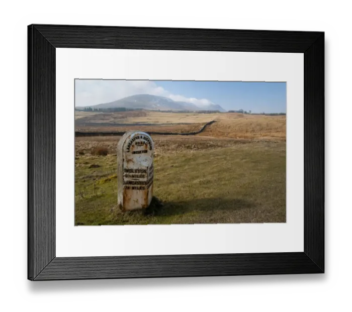 Framed Print : Mile marker showing six and quarter miles to Ingleton and 24 miles to Lancaster, on roadside near Ingleborough