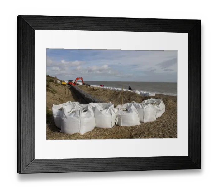 Framed Print : Repairing the sea defences at Thorpeness on the Suffolk Coast Framed Print : Repairing the sea defences at Thorpeness on the Suffolk Coast