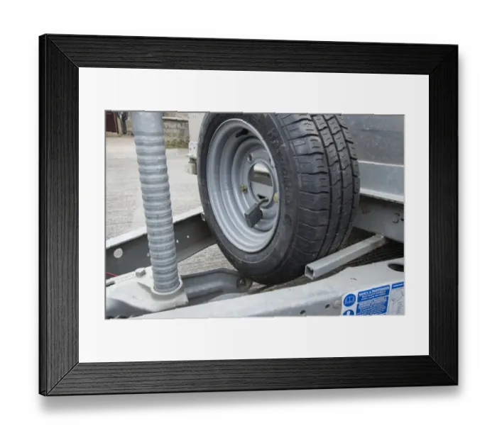 Framed Print : Spare wheel lock on farm trailer in farmyard, Lancashire, England, August Framed Print : Spare wheel lock on farm trailer in farmyard, Lancashire, England, August