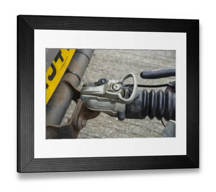 Framed Print : Locking tow bar on farm trailer in farmyard, Lancashire, England, August