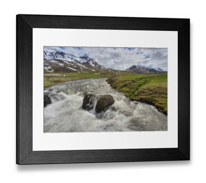 Framed Print : View of fast flowing river with mountains in background, Iceland, June Framed Print : View of fast flowing river with mountains in background, Iceland, June