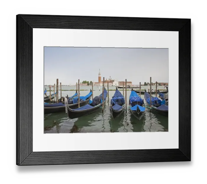 Framed Print : View of moored gondolas across waterway towards 16th century Benedictine church, Church of San Giorgio Maggiore Framed Print : View of moored gondolas across waterway towards 16th century Benedictine church, Church of San Giorgio Maggiore