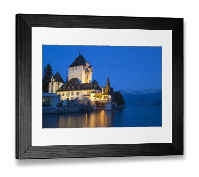 Framed Print : View of lakeside castle illuminated at night, Oberhofen Castle, Lake Thun, Oberhofen, Bernese Oberland, Switzerland Framed Print : View of lakeside castle illuminated at night, Oberhofen Castle, Lake Thun, Oberhofen, Bernese Oberland, Switzerland