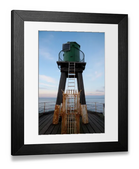 Framed Print : Early 20th century wooden lighhouse at end of pier, West Pier, Whitby, North Yorkshire, England, March Framed Print : Early 20th century wooden lighhouse at end of pier, West Pier, Whitby, North Yorkshire, England, March