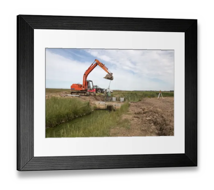 Framed Print : Metal pilings being fitting to make a sluice gate to retain water at Deepdale Marsh, Burnham Deepdale, North Norfolk Framed Print : Metal pilings being fitting to make a sluice gate to retain water at Deepdale Marsh, Burnham Deepdale, North Norfolk