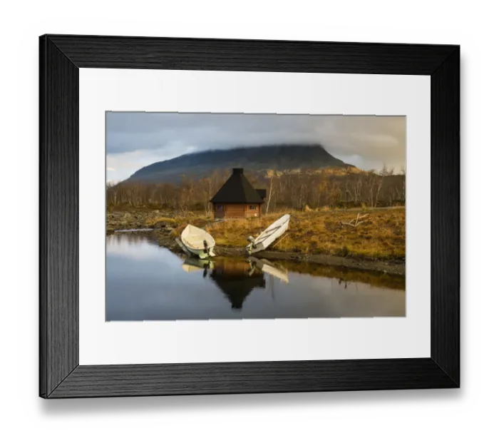 Framed Print : Boats moored on lake shore with Kota (hut), with summit of Saana Fell in background, Lake Kilpis, Kilpisjarvi Framed Print : Boats moored on lake shore with Kota (hut), with summit of Saana Fell in background, Lake Kilpis, Kilpisjarvi
