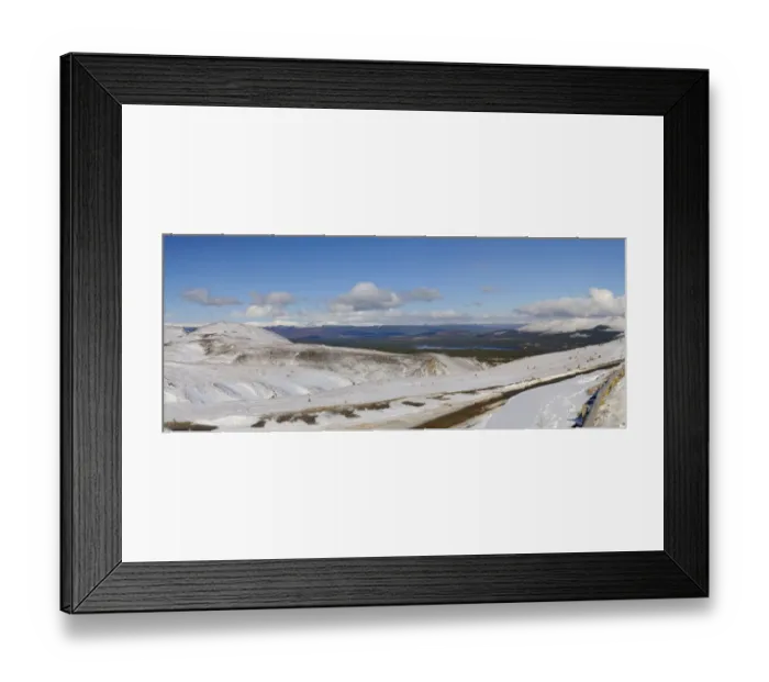 Framed Print : View across snow covered mountain, looking towards Loch Morlich with Aviemore and Monadhliath Mountains in distance Framed Print : View across snow covered mountain, looking towards Loch Morlich with Aviemore and Monadhliath Mountains in distance