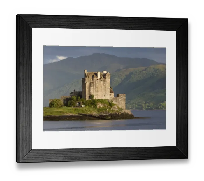 Framed Print : View of restored castle on tidal island in sea loch, in evening sunlight, Eilean Donan Castle, Loch Duich Framed Print : View of restored castle on tidal island in sea loch, in evening sunlight, Eilean Donan Castle, Loch Duich