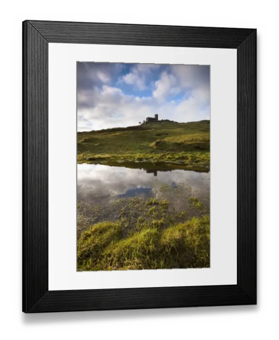 Framed Print : View of 13th century church reflected in large pool created by exceptional winter rain on moorland, Church of St Framed Print : View of 13th century church reflected in large pool created by exceptional winter rain on moorland, Church of St