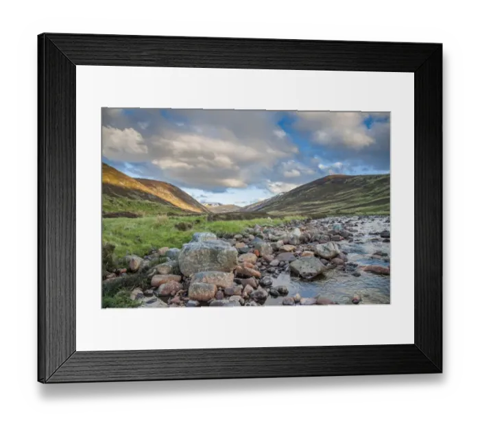 Framed Print : View of river flowing through glen, in evening sunlight, Clunie Water, near Braemar, Cairngorms N. P