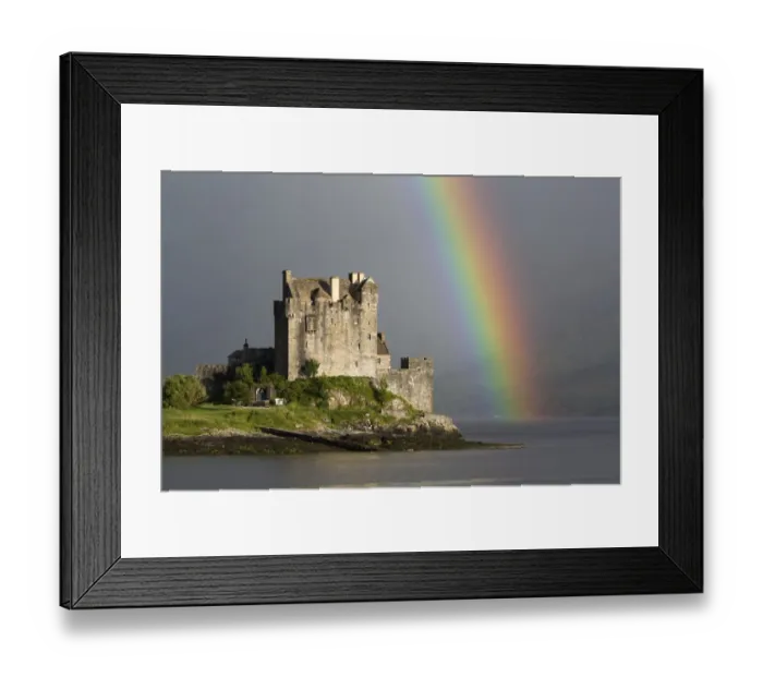 Framed Print : View of restored castle on tidal island in sea loch with rainbow, in evening sunlight, Eilean Donan Castle, Loch Duich Framed Print : View of restored castle on tidal island in sea loch with rainbow, in evening sunlight, Eilean Donan Castle, Loch Duich