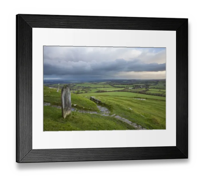 Framed Print : View of graveyard and path leading from 13th century church on moorland at sunrise Framed Print : View of graveyard and path leading from 13th century church on moorland at sunrise