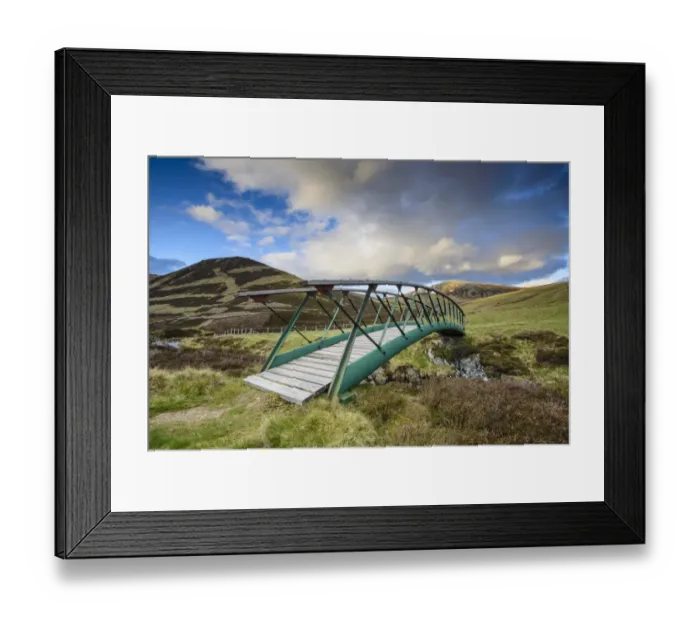Framed Print : Metal footbridge over river in glen, in evening sunlight, Clunie Water, near Braemar, Cairngorms N. P Framed Print : Metal footbridge over river in glen, in evening sunlight, Clunie Water, near Braemar, Cairngorms N. P