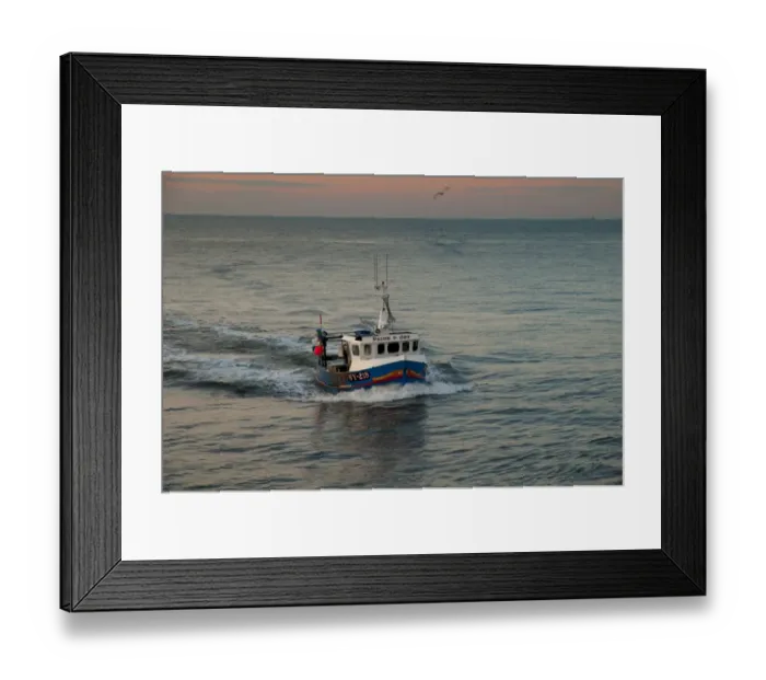 Framed Print : Small crab and lobster fishing boat Pride and Joy WY 218 returning to port at dusk, Whitby, North Yorkshire, England