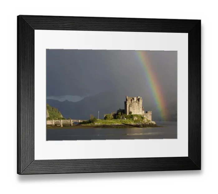 Framed Print : View of restored castle on tidal island in sea loch with rainbow, in evening sunlight, Eilean Donan Castle, Loch Duich Framed Print : View of restored castle on tidal island in sea loch with rainbow, in evening sunlight, Eilean Donan Castle, Loch Duich