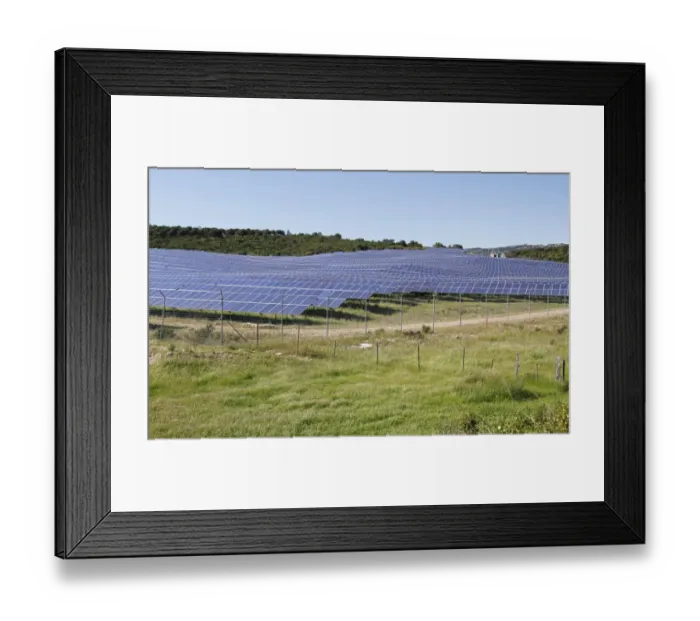 Framed Print : Solar panels on solar farm in open field, near Bonifacio, Corsica, France, April