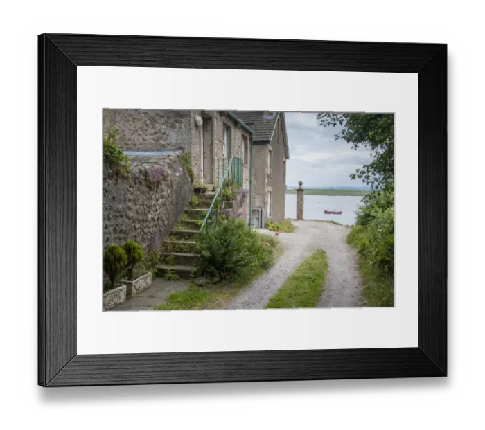 Framed Print : Houses in coastal village and river, only community on U. K. mainland dependent upon tidal access Framed Print : Houses in coastal village and river, only community on U. K. mainland dependent upon tidal access
