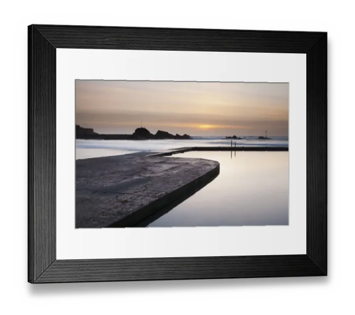 Framed Print : View of tidal swimming pool with incoming tide and waves breaking over breakwater at sunset, Bude Sea Pool Framed Print : View of tidal swimming pool with incoming tide and waves breaking over breakwater at sunset, Bude Sea Pool