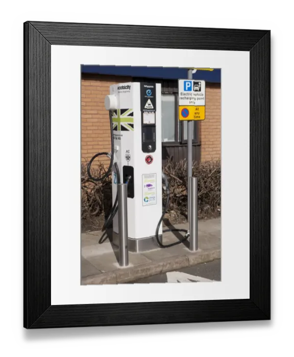 Framed Print : Recharging point for electric cars at motorway service area, England, April Framed Print : Recharging point for electric cars at motorway service area, England, April