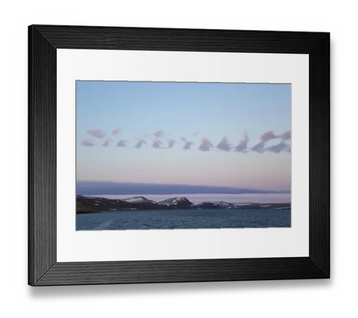 Framed Print : Cirrus Kelvin-Helmholtz wave cloud formation over coastline at dusk, Hinlopenstretet, Spitsbergen, Svalbard, August