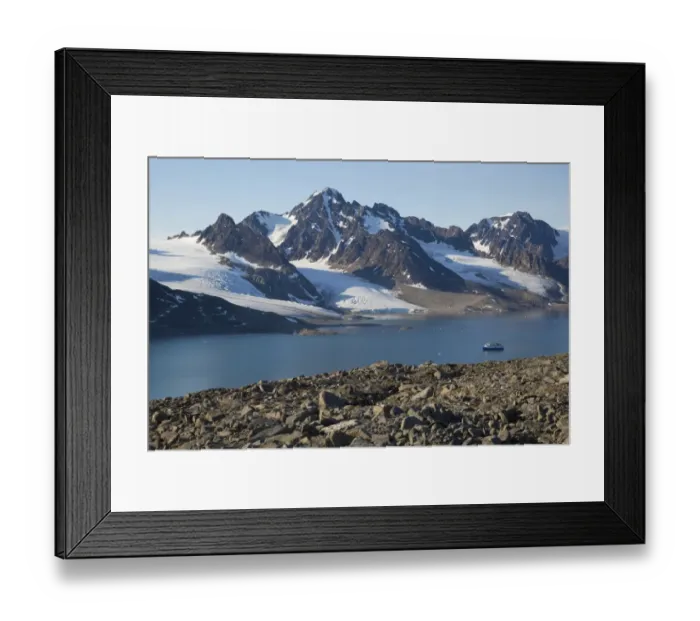 Framed Print : View of fjord coastline with mountains, glacier and MS Quest icebreaker cruise ship, Raudfjorden, Spitsbergen