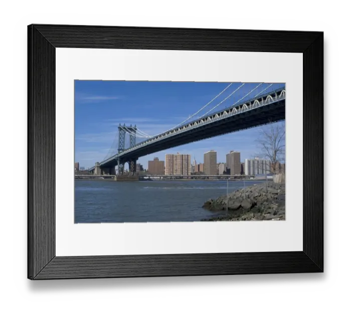 Framed Print : View of suspension bridge and saltwater tidal strait, looking towards Lower Manhattan, Manhattan Bridge, East River