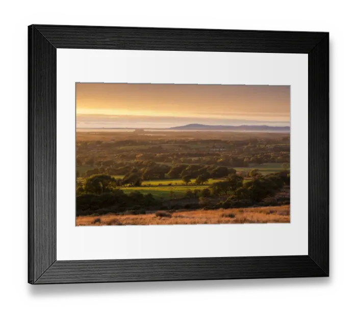 Framed Print : View of farmland on coastal plain at sunset, looking towards Morecambe Bay with Lake District fells in background Framed Print : View of farmland on coastal plain at sunset, looking towards Morecambe Bay with Lake District fells in background