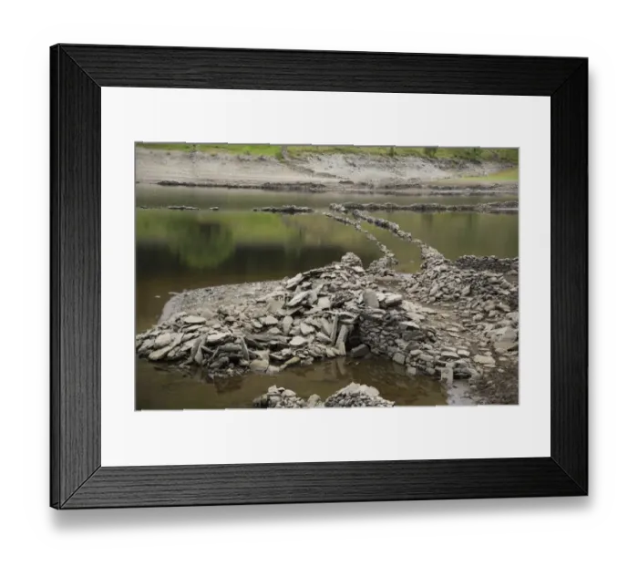 Framed Print : Upland reservoir with low water level and remains of submerged village exposed after dry summer, Mardale Green Framed Print : Upland reservoir with low water level and remains of submerged village exposed after dry summer, Mardale Green