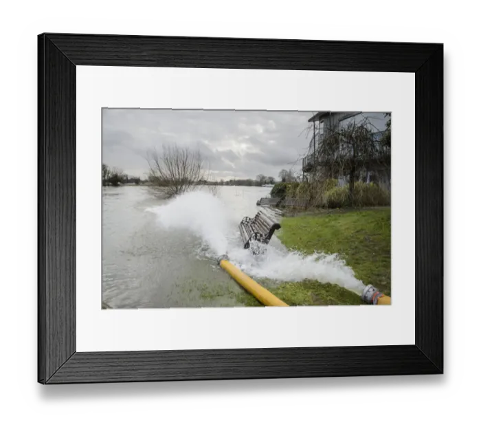 Framed Print : Floodwater pumped back into river during flood, River Thames, Chertsey, Surrey, England, February 2014 Framed Print : Floodwater pumped back into river during flood, River Thames, Chertsey, Surrey, England, February 2014