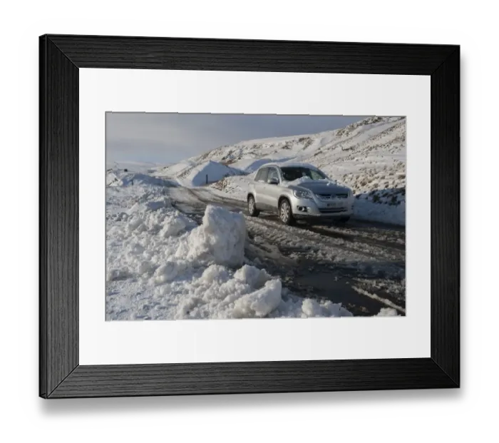 Framed Print : Snow and slush covered road with car on moorland, Yorkshire Dales N. P. North Yorkshire, England, January Framed Print : Snow and slush covered road with car on moorland, Yorkshire Dales N. P. North Yorkshire, England, January