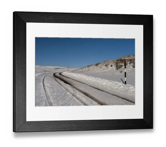 Framed Print : Snow covered road on moorland, with poles indicating snow depth levels, Yorkshire Dales N. P Framed Print : Snow covered road on moorland, with poles indicating snow depth levels, Yorkshire Dales N. P
