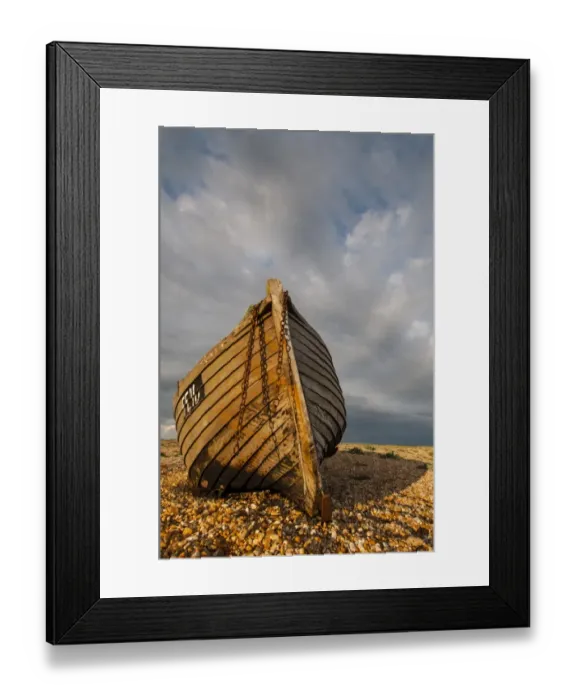 Framed Print : Abandoned fishing boat on shingle beach, Dungeness, Kent, England, April Framed Print : Abandoned fishing boat on shingle beach, Dungeness, Kent, England, April