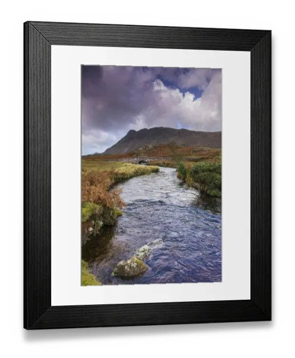 Framed Print : View of river and bridge in upland valley, with Seatallan Peak in background, Overbeck Bridge, Over Beck Framed Print : View of river and bridge in upland valley, with Seatallan Peak in background, Overbeck Bridge, Over Beck